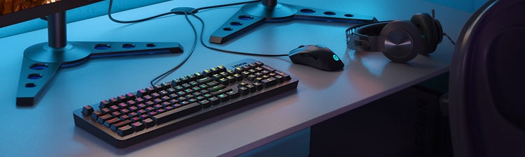 Gaming keyboard, mouse and headset on desk