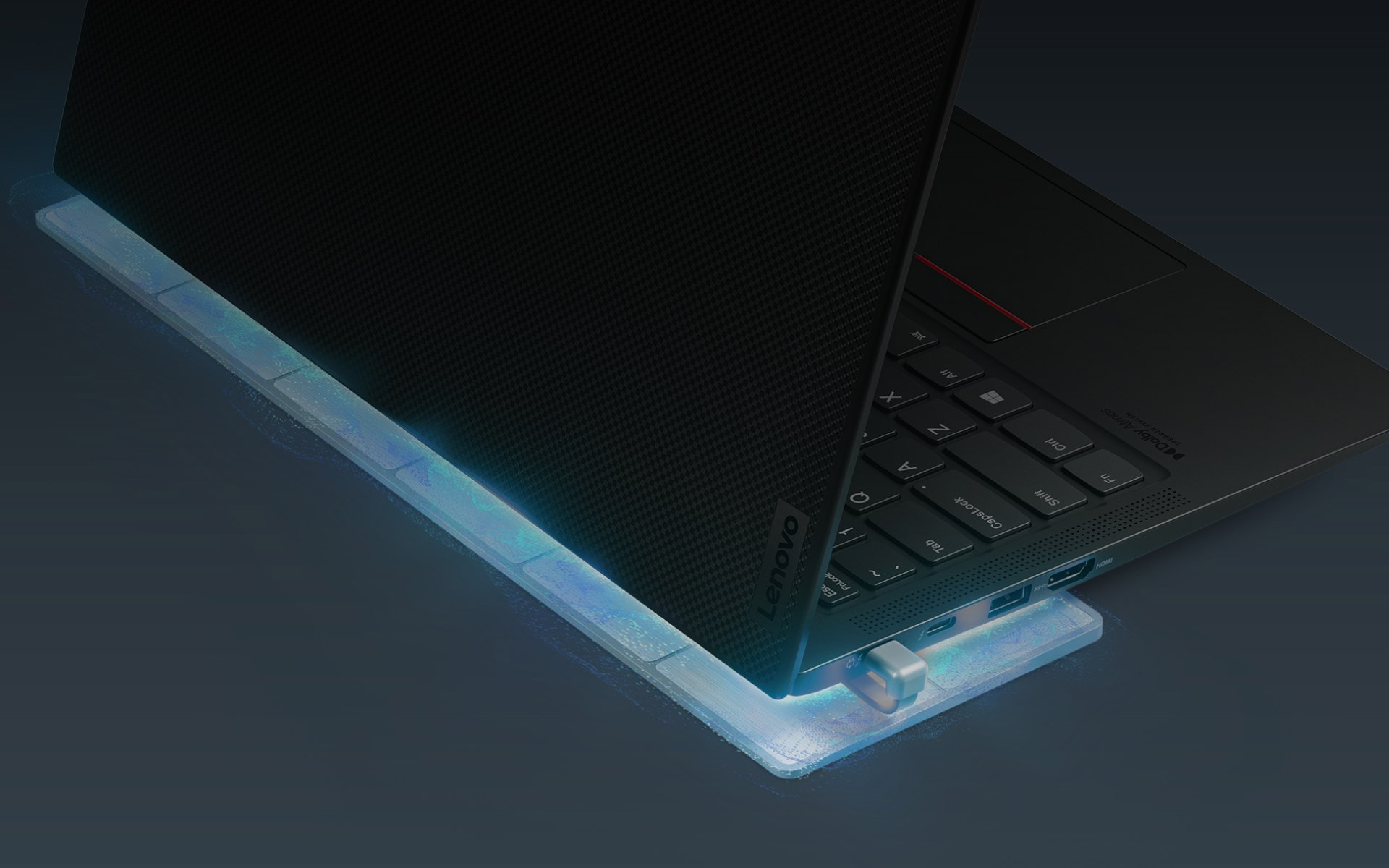 Lenovo Go USB-C Wireless Charging Kit wirelessly charging a laptop