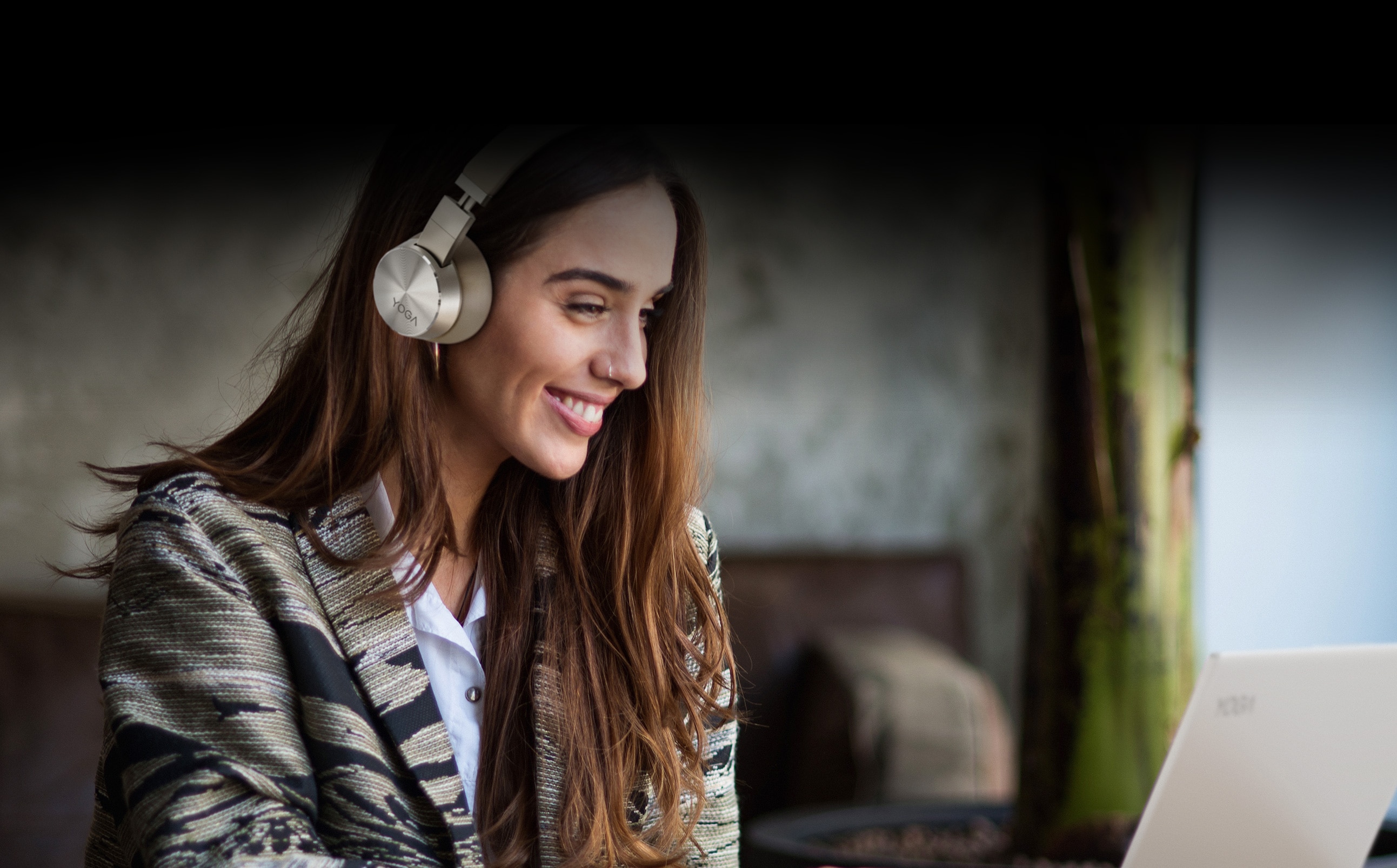 Woman wearing Yoga ANC Headphones