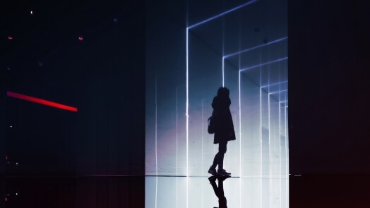 Person walking in a futuristic hall