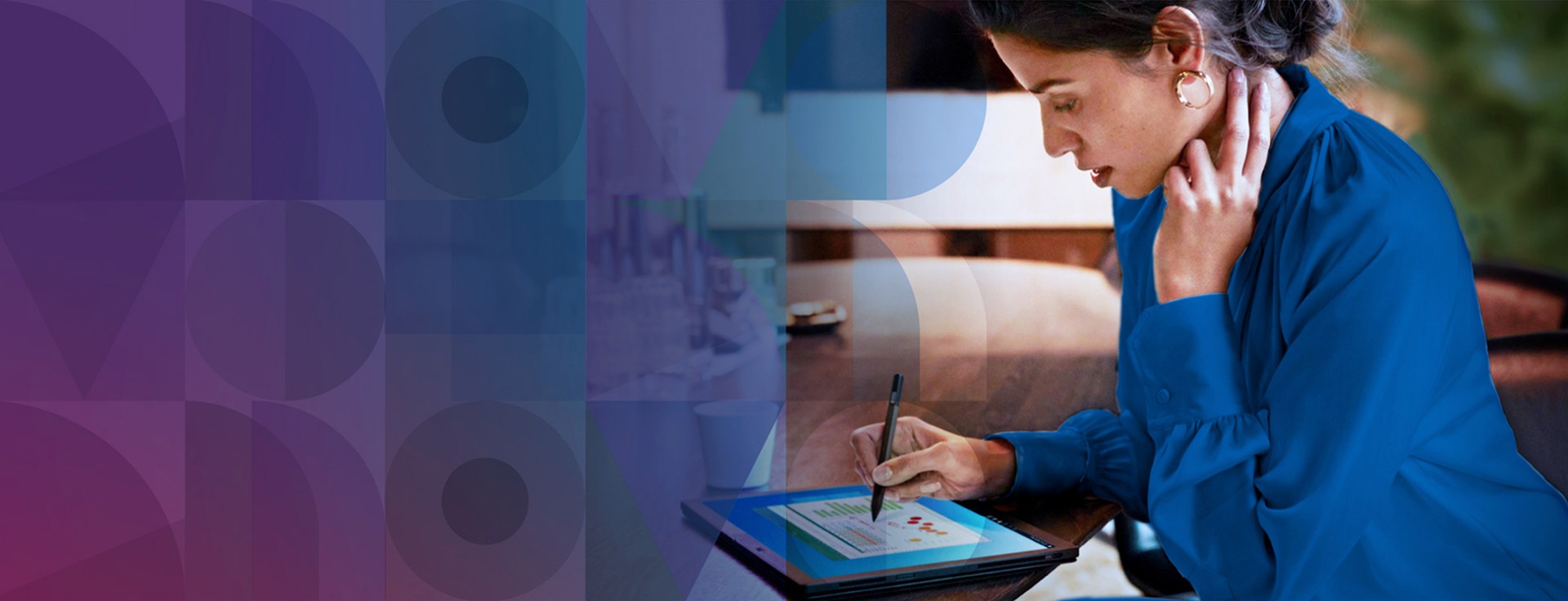 Woman at home working on a tablet