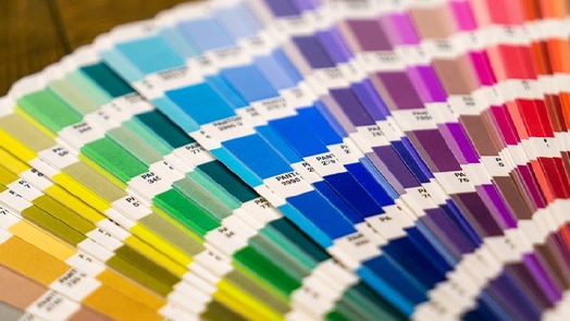 Multi-colored paint swatches depicting customer success stories