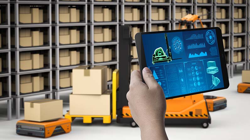 man using tablet for warehouse inventory