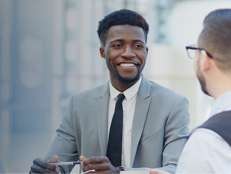 Two business people talking