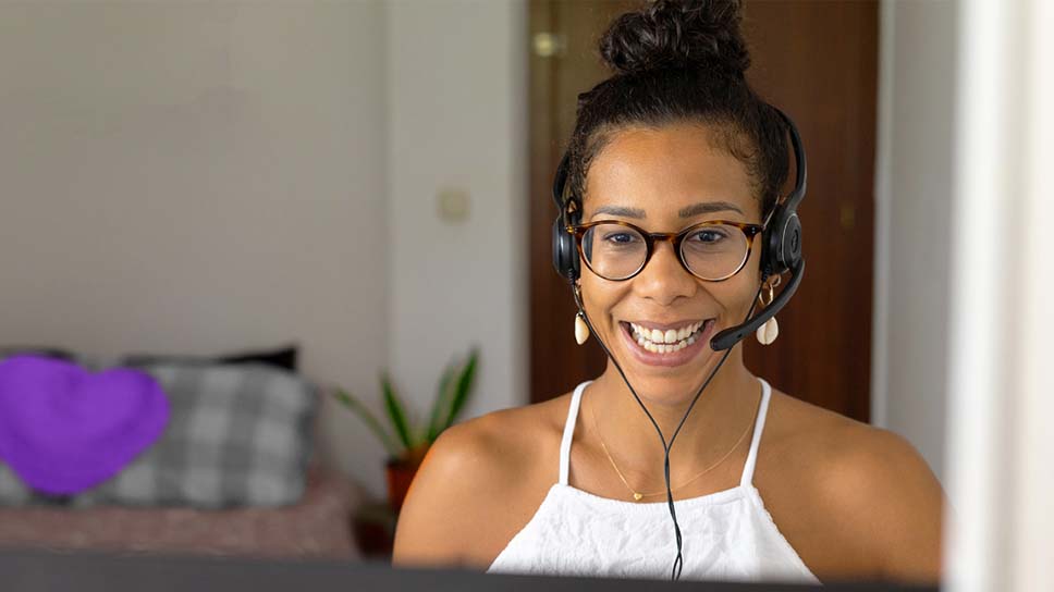 Woman working from home using headsets