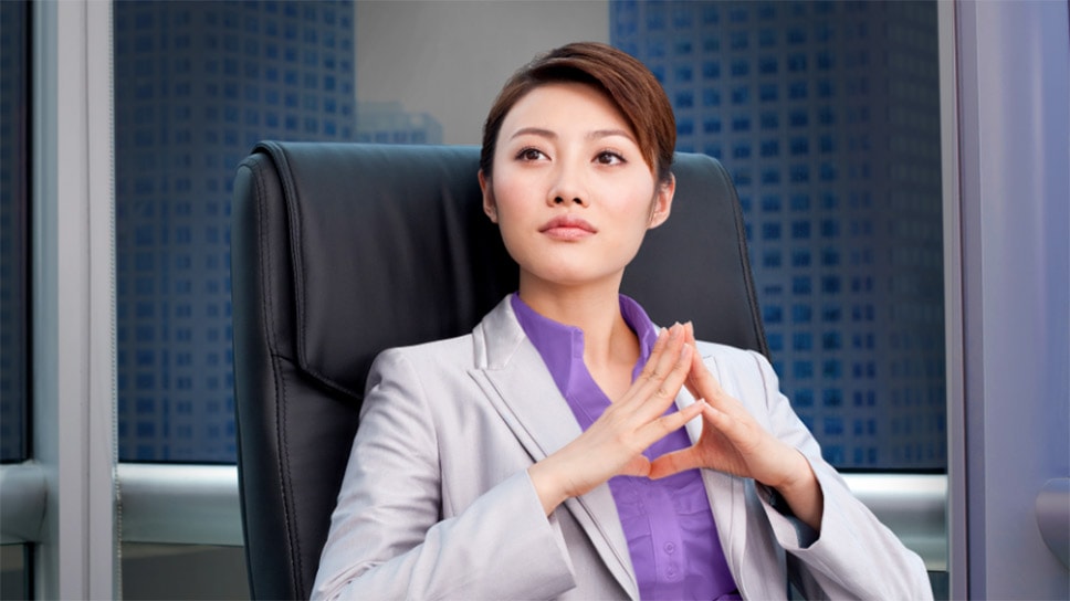 Business woman sitting at desk