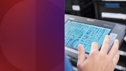 Person using a tablet in factory automation setting