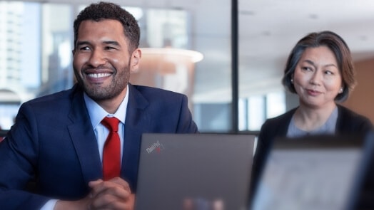 Man and woman in conference room