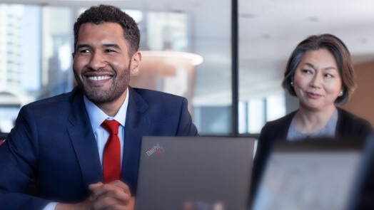 Professionnels des TI dans une salle de conférence