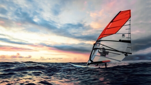 Windsurfer moving across the water